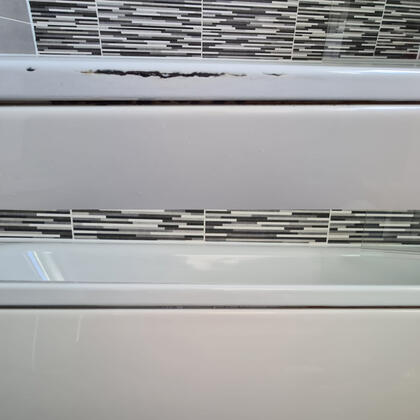 before and after picture of a steel bath rust repair completed in Swindon Wiltshire